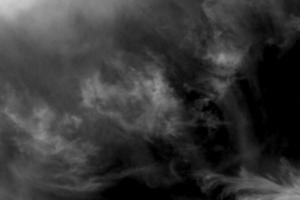 Textured cloud,Abstract black,isolated on black background photo