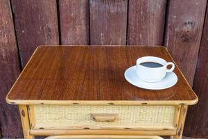 White coffee cup on table photo