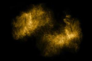 Nube texturizada,abstracto dorado,aislado sobre fondo negro foto