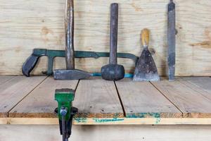 The vise to clamp with wooden desk,selected focus photo