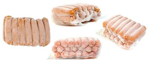 frozen sausage in plastic bag set with ice crystals isolated on white background photo