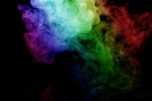 Abstract smoke isolated on black background,Rainbow powder photo