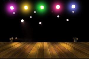 top desk with light bokeh in concert blur background,wooden table photo