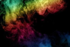 Abstract smoke isolated on black background,Rainbow powder photo