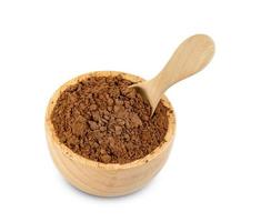 Cocoa powder with bowl and wooden spoon isolated on white background ,include clipping path photo