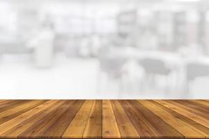 Empty wooden board space platform with library blur background photo