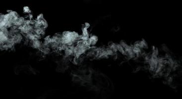 Abstract powder or smoke isolated on black background photo