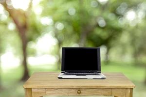 The desk in garden background. photo