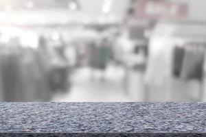 Marble table top with shopping mall blurred background photo