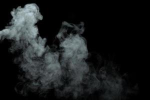 Abstract powder or smoke isolated on black background,Out of focus photo
