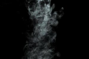 Abstract powder or smoke isolated on black background photo