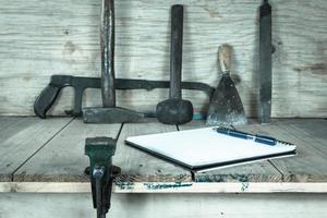 The vise to clamp with wooden desk,filter effect,selected focus photo