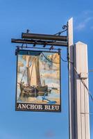 BOSHAM, WEST SUSSEX, UK - January 1. Blue Anchor Pub Sign in Bosham West Sussex on January 1, 2013 photo