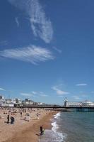 Brighton, East Sussex, UK - July 15, 2022. View of the beach and pier  in Brighton on July 15, 2022. Unidentified people photo