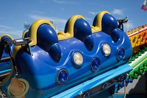 Brighton, East Sussex, UK - July 15, 2022. View of a carousel ride on the pier in Brighton on July 15, 2022 photo