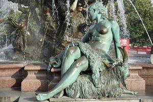 Berlin, Germany, 2014. View of the Neptune Fountain in Berlin photo