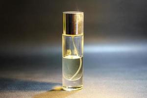 transparent parfum bottle in photo studio, Clear parfum glass bottle with spray cap