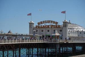 Brighton, East Sussex, UK - July 15, 2022. View of the pier in Brighton on July 15, 2022. Unidentified people photo