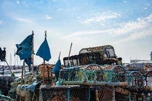 SCARBOROUGH,  NORTH YORKSHIRE, UK - JULY 18. Lobster pots in the harbour in Scarborough, North Yorkshire on July 18, 2022 photo