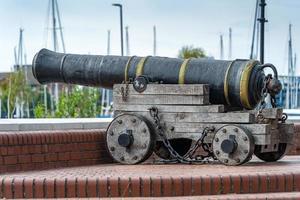 KINGSTON UPON HULL,  YORKSHIRE, UK - JULY 17. Old cannon overlooking the marina in Kingston upon Hull on July 17, 2022 photo