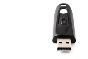 USB flash drive on a white background. Free space for text photo