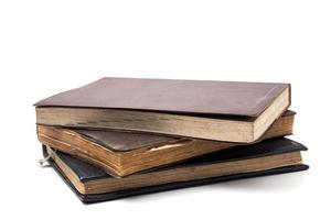 A stack of old books on a white background. photo