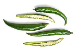 Fresh Green chili papper on white background. photo