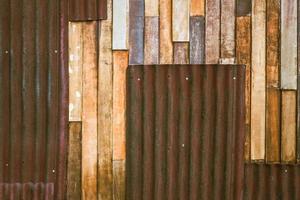 Old wood plank with galvanized iron background. photo