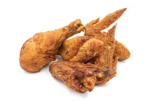 Fried chicken legs and wings on a white background. photo