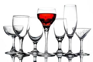 Collage of empty glasses with wine on white background. photo