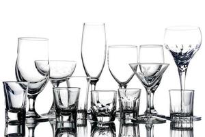 Collage of empty glasses on white background. photo