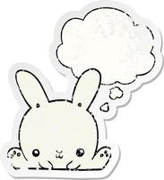 cartoon rabbit and thought bubble as a distressed worn sticker vector