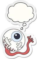 cartoon injured eyeball and thought bubble as a printed sticker