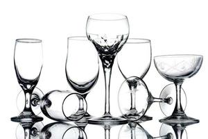 Collage of empty glasses on white background. photo