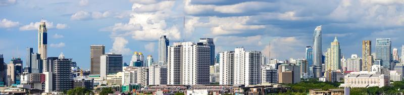 Panorama image - Modern building in business district at Bangkok city, Thailand. photo