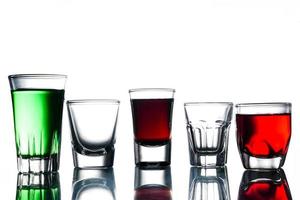 Collage of glasses with cocktail on a white background. photo