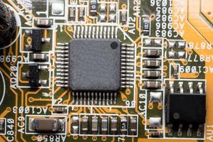 placa de circuito de computadora, fondo de tecnología electrónica. foto