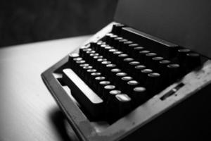 Close up of old typewriter on the table. Black and White tone photo