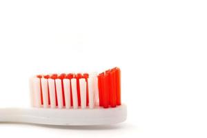 Close up of Toothbrush on a white background. photo