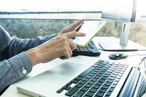 Male hands working on computer and tablet, Software programming web development concept photo