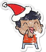 distressed sticker cartoon of a man laughing wearing santa hat vector