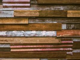 Old wood plank with galvanized iron background. photo