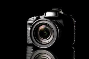 Digital camera on black background. photo