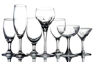 Collage of empty glasses on white background. photo