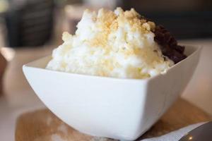 Shaved ice with red bean and milk. photo