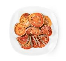 Dry bael fruit or Aegle marmelos in dish isolated on white background ,include clipping path photo