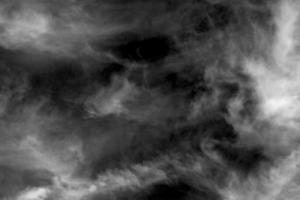 Textured cloud,Abstract black,isolated on black background photo