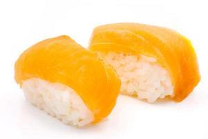 Sushi, japanese food, rice with salmon on white background. photo