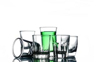 Collage of glasses with cocktail on a white background. photo