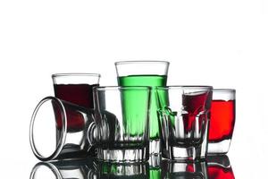 Collage of glasses with cocktail on a white background. photo